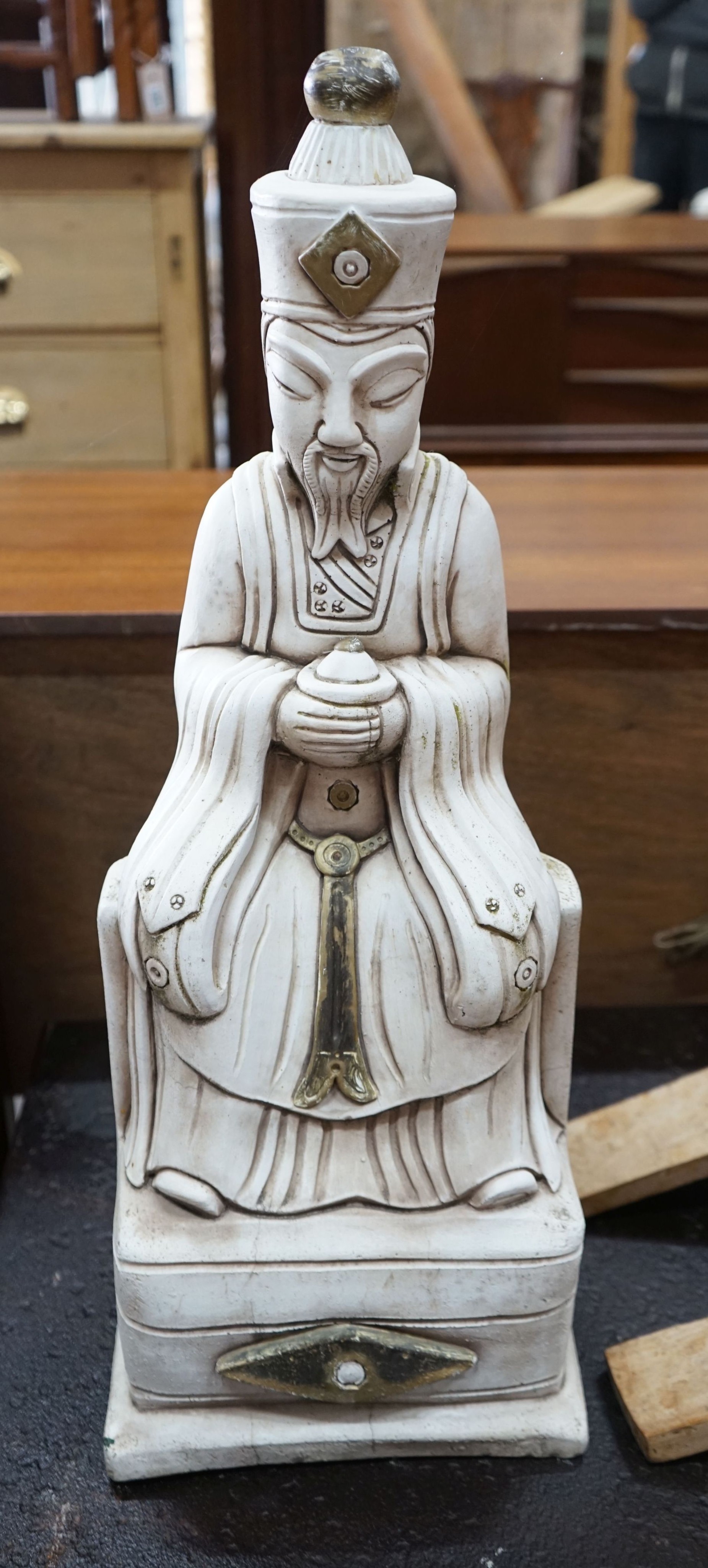 A pair of stone seated Buddha garden ornaments, height 62cm